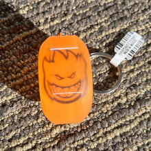 Load image into Gallery viewer, Orange Spitfire keychain Bighead Logo on riding surface
